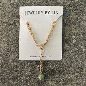 Gold double chain bracelet